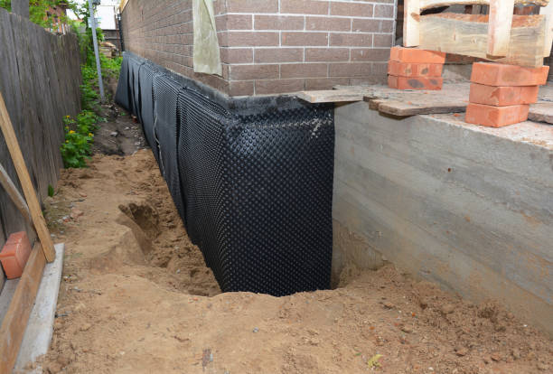 SJ Waterproofing Pros technician performing targeted Waterproofing assessment in Syria, VA